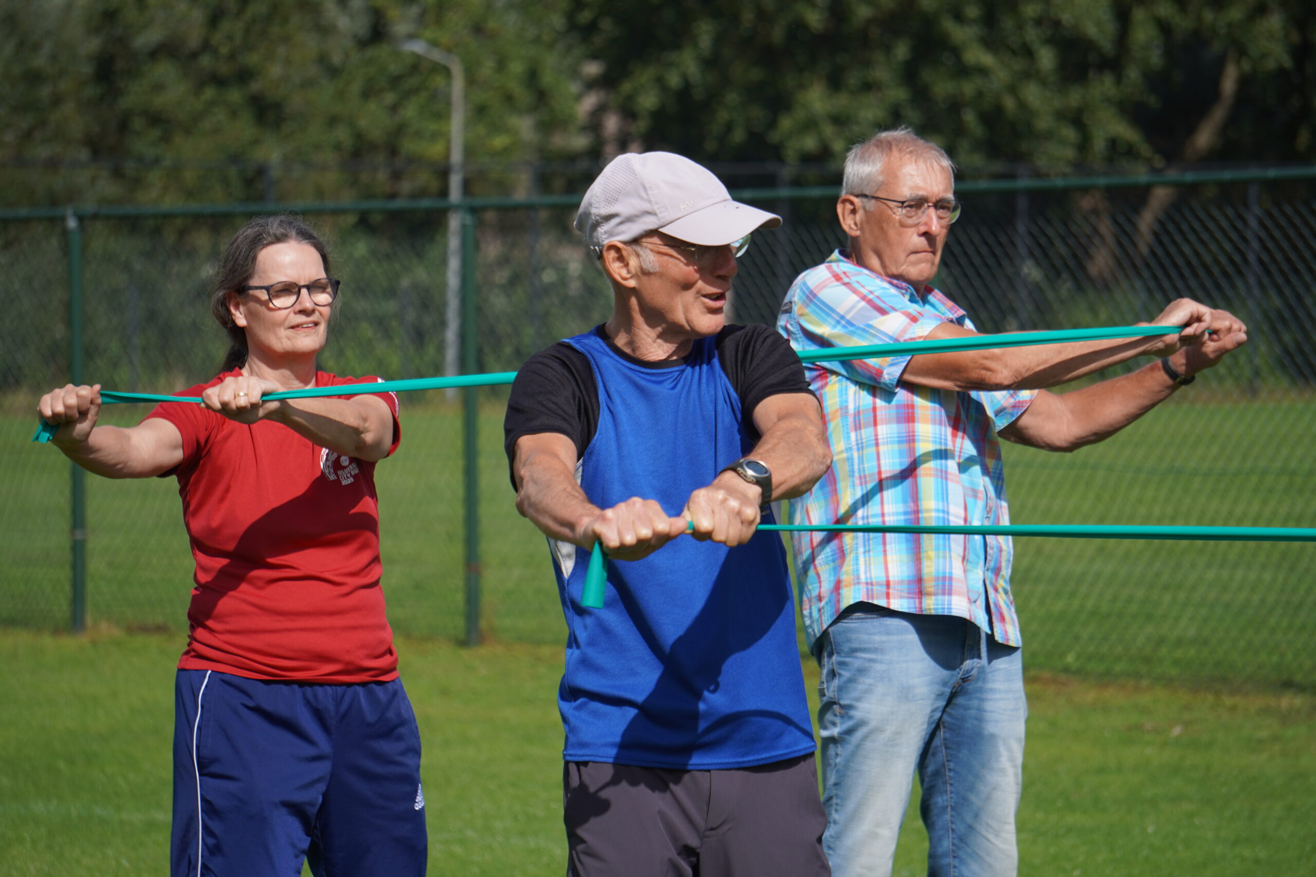 Afbeelding met senioren aan het sporten tijdens het evenement